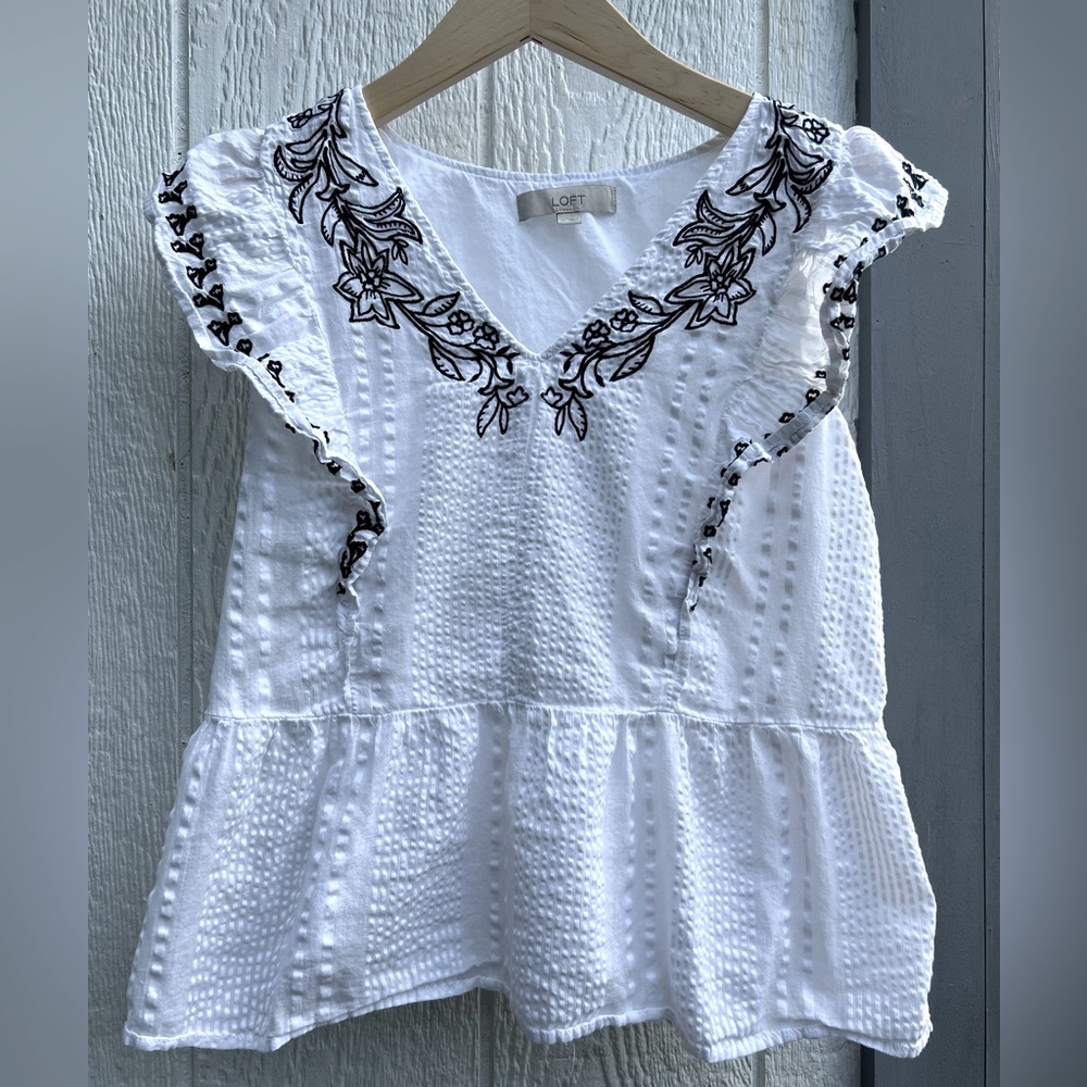 Floral appliqué top